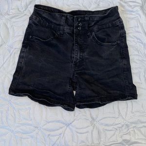 Black denim shorts.